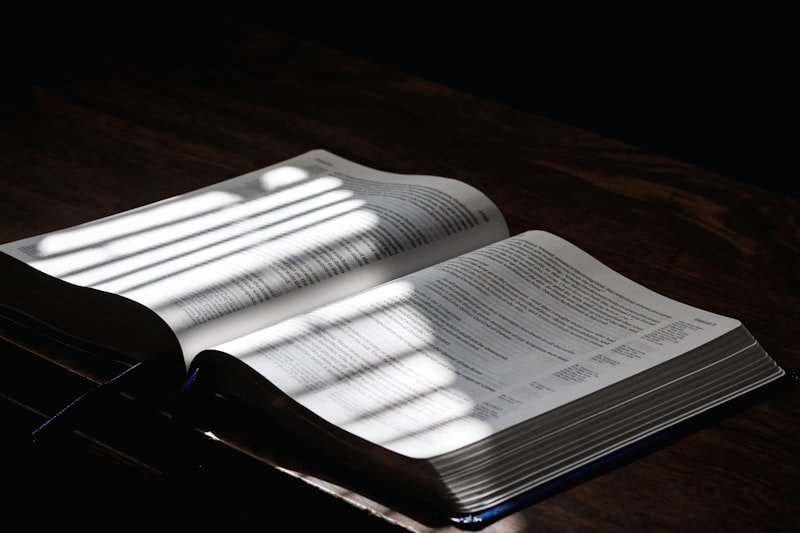 white printer paper on brown wooden table