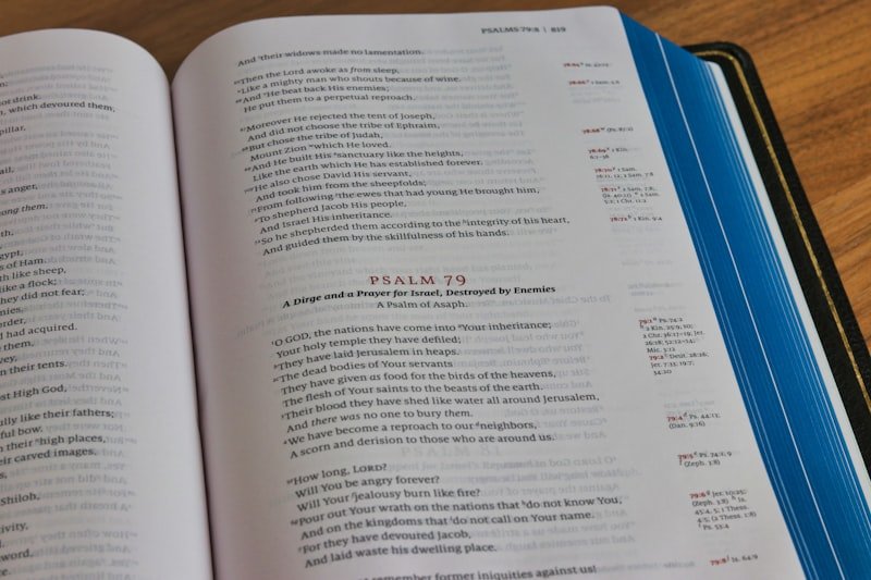 white book page on brown wooden table
