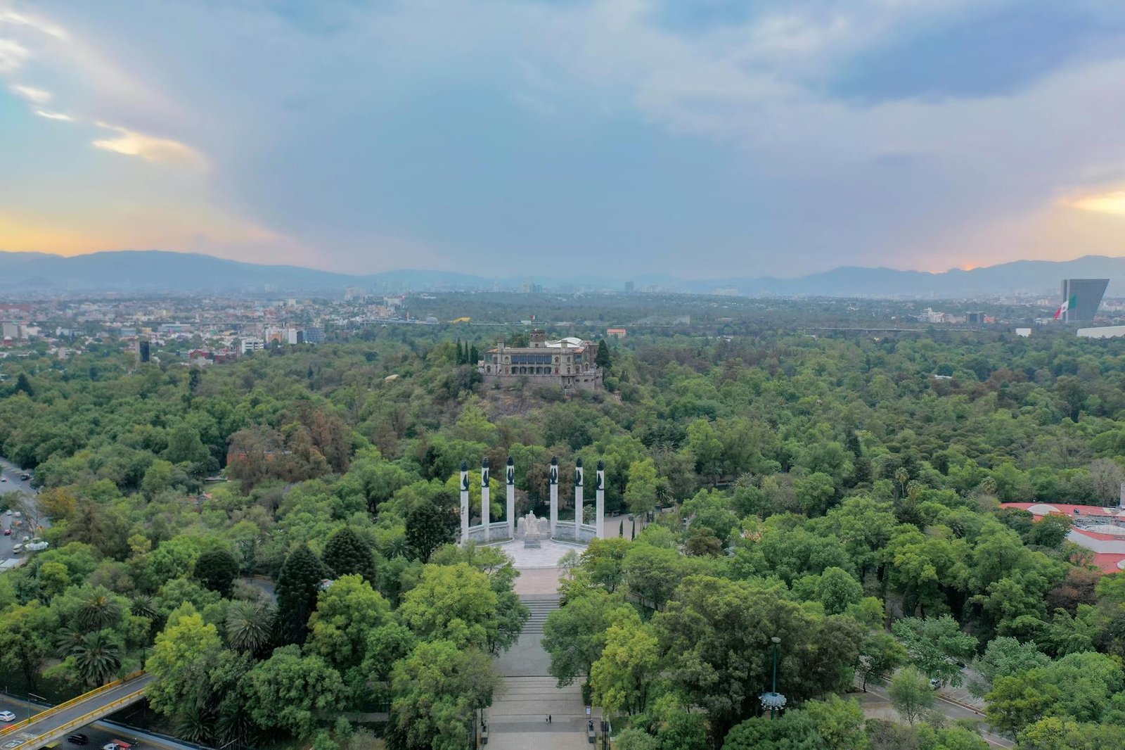 Stunning aerial view of Chapultepec Park and Mexico City at sunset.