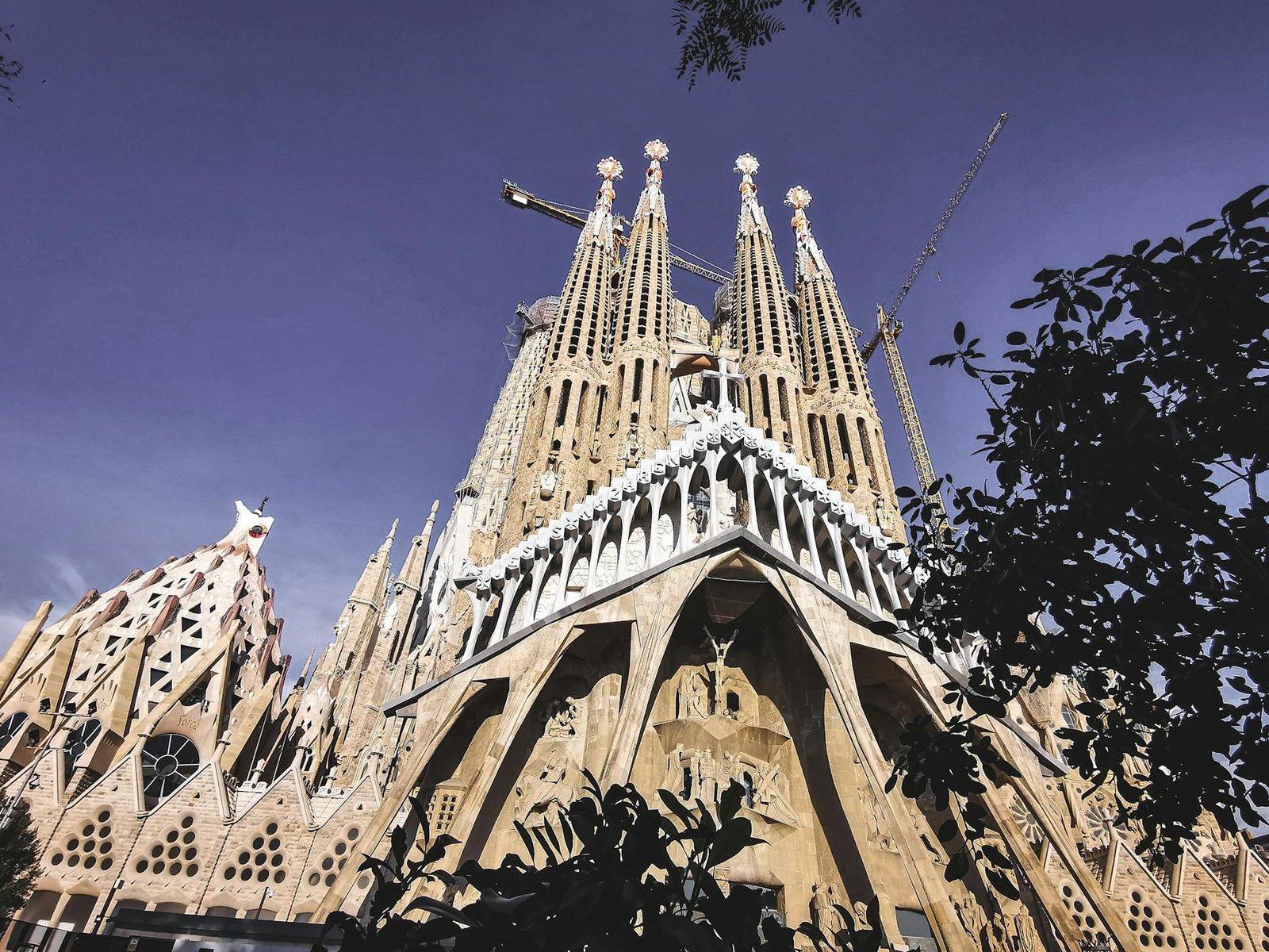 Stunning view of La Sagrada Familia's intricate facade and spires in Barcelona.