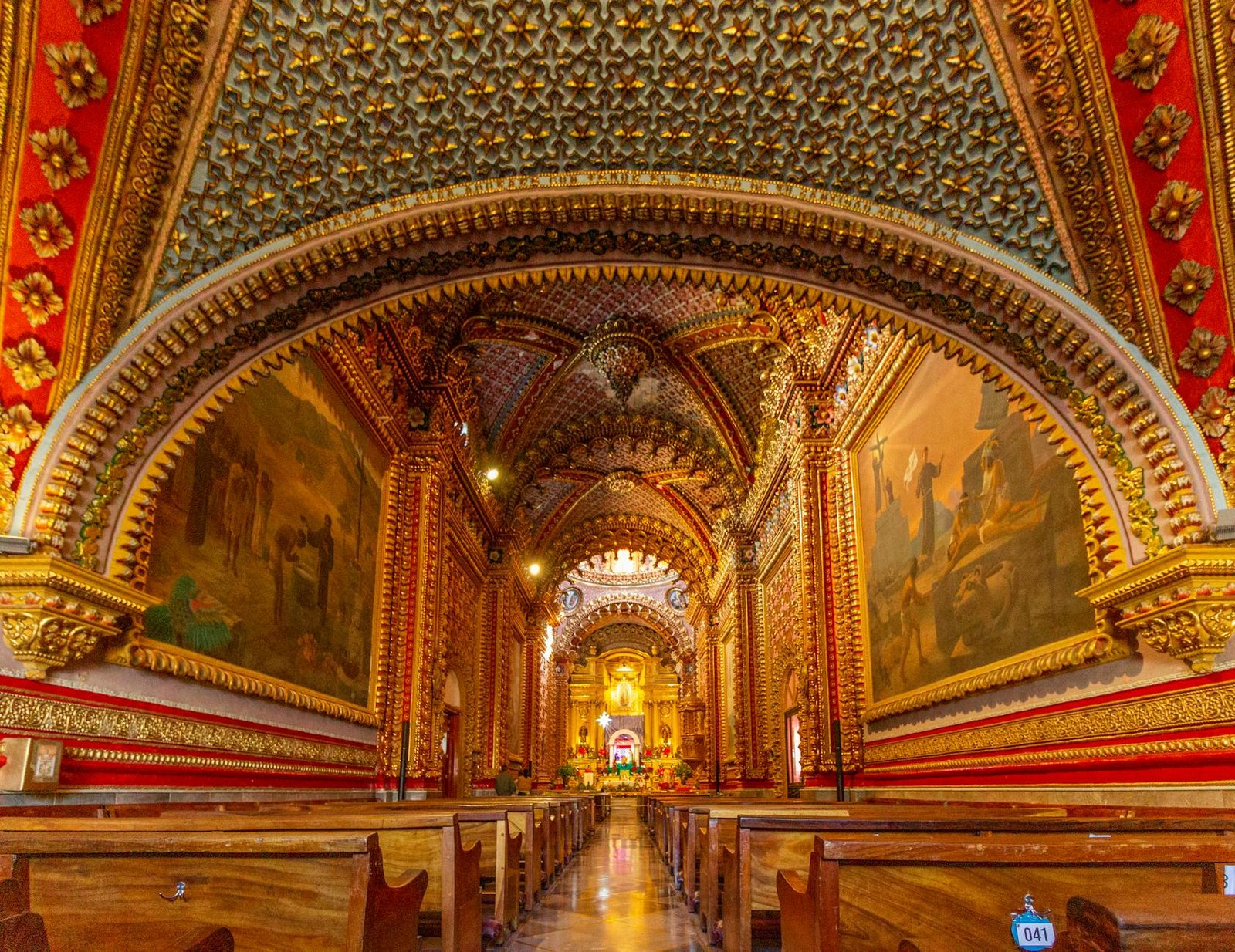 Stunning baroque church interior with elaborate gold detailing in Morelia, Mexico.
