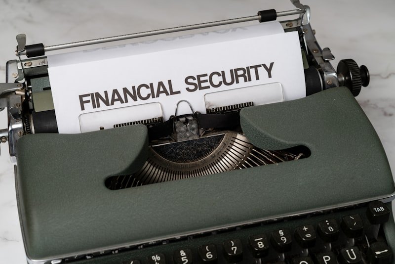 a close up of a typewriter with a financial security sign on it