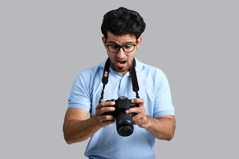 a man holding a camera