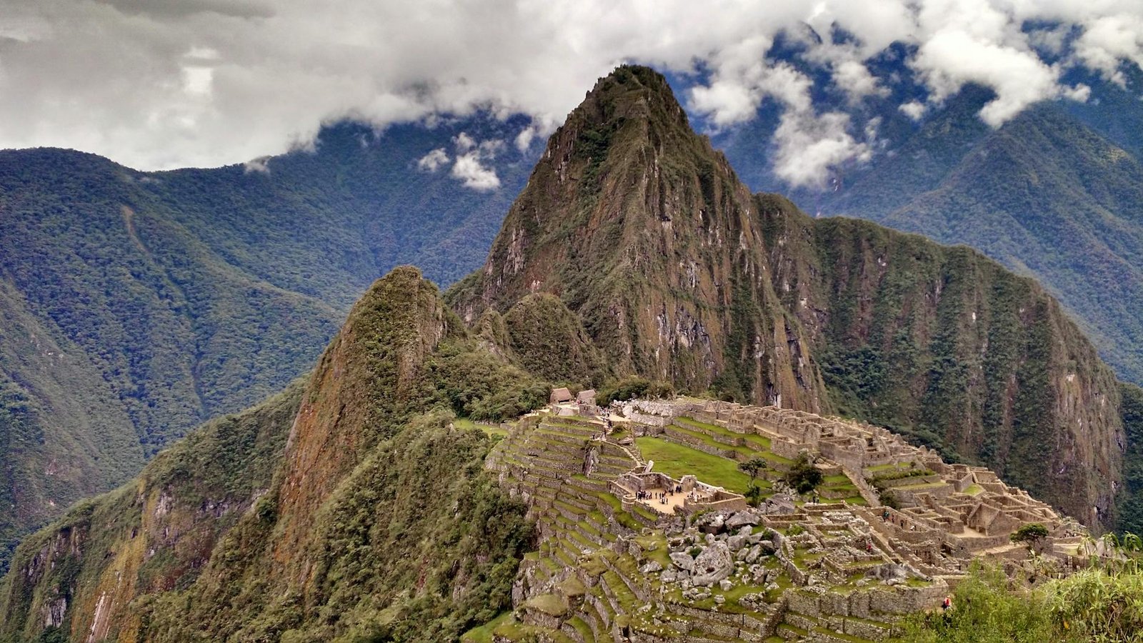Breathtaking aerial view of Machu Picchu, nestled in the Andes Mountains of Peru, a top tourist destination.