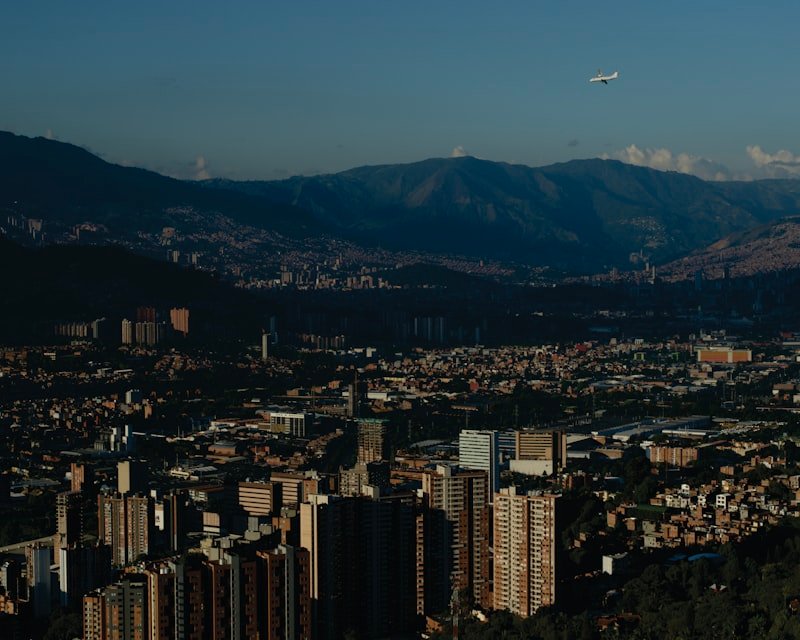 A view of a city with mountains in the background