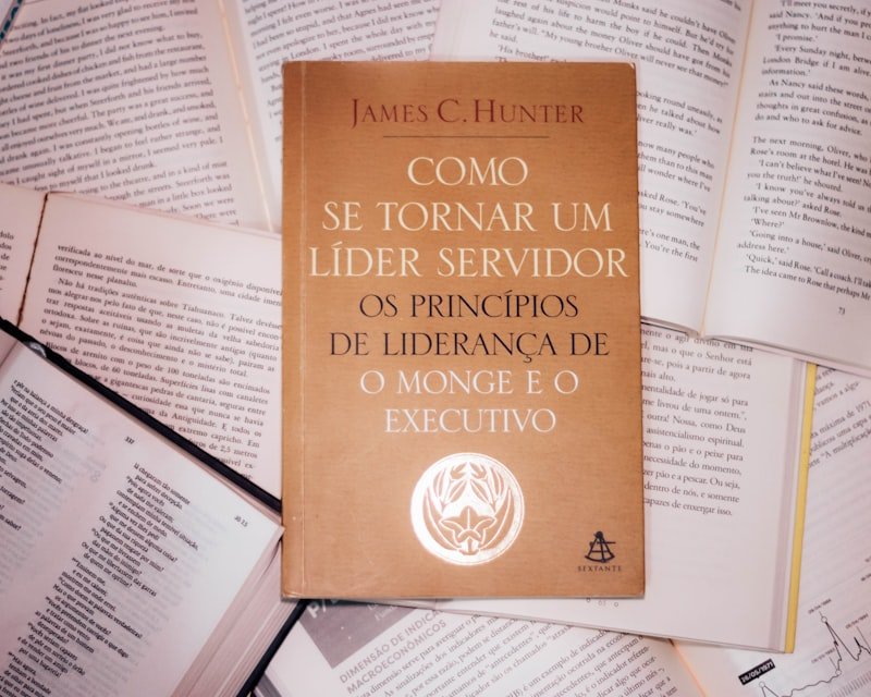 a book sitting on top of a pile of books