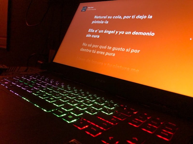 A laptop computer sitting on top of a desk